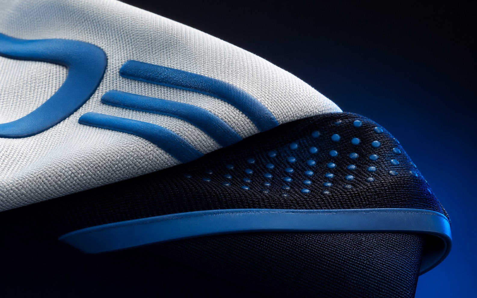 Blue silicone print and grip treatment on technical textile